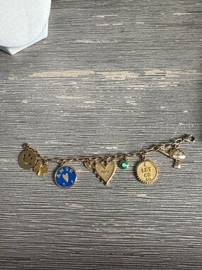 HART Gold Charm Bracelet with 9 charms.